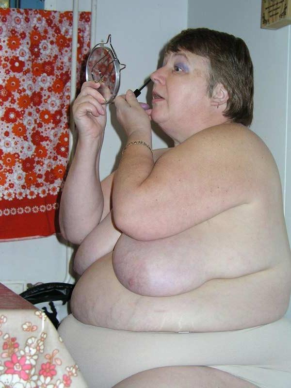 16P Big fat old granny showing her naked huge body