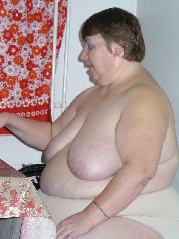 16P Big fat old granny showing her naked huge body