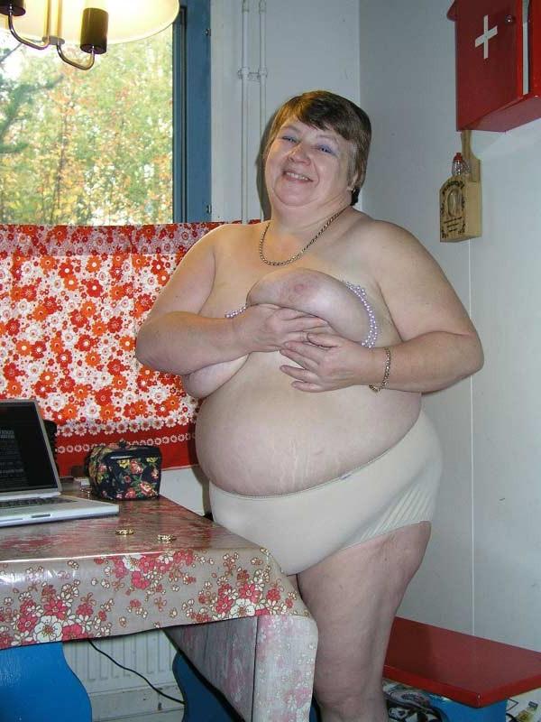 16P Big fat old granny showing her naked huge body