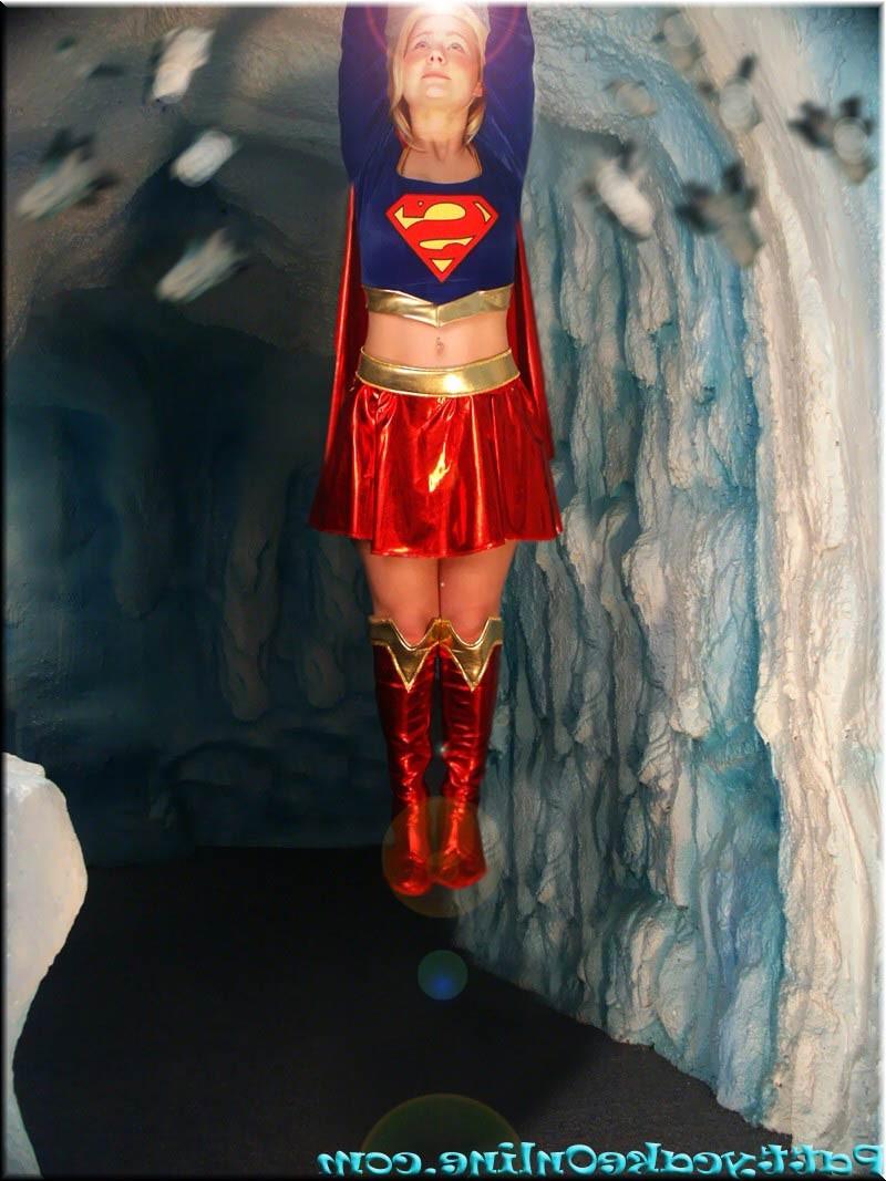 16P Busty teen girl dressed in superwoman uniform