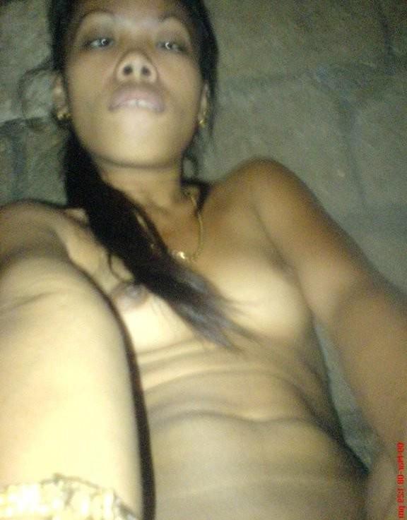 16P Asian slut posing and sticking lollipop up her poontang