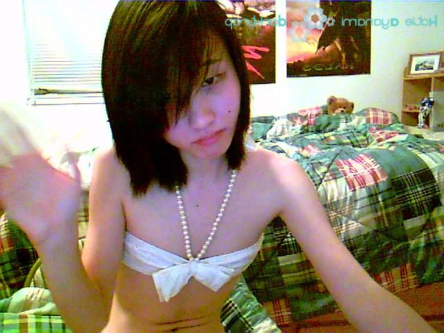 16P Young japanese newhalf in white bikini