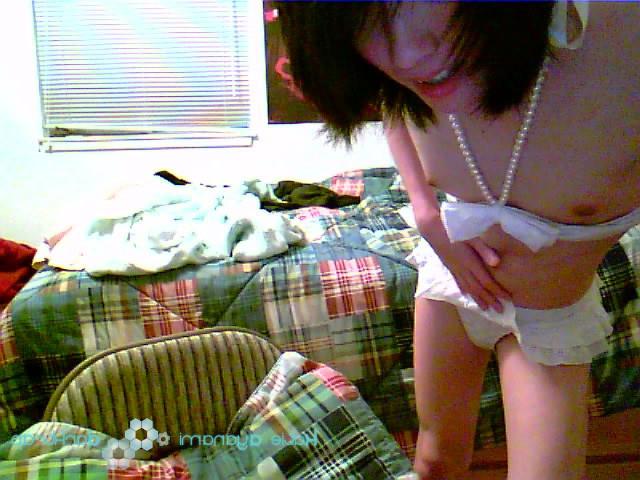 16P Young japanese newhalf in white bikini