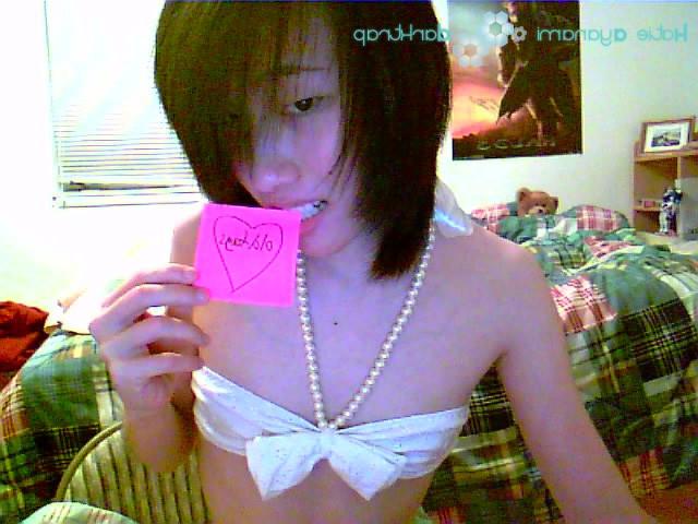 16P Young japanese newhalf in white bikini