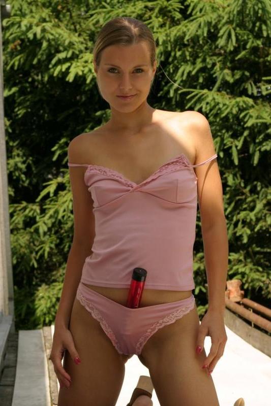 20P Teasing blonde teen loves stuffing dildo in her twat in outdoor