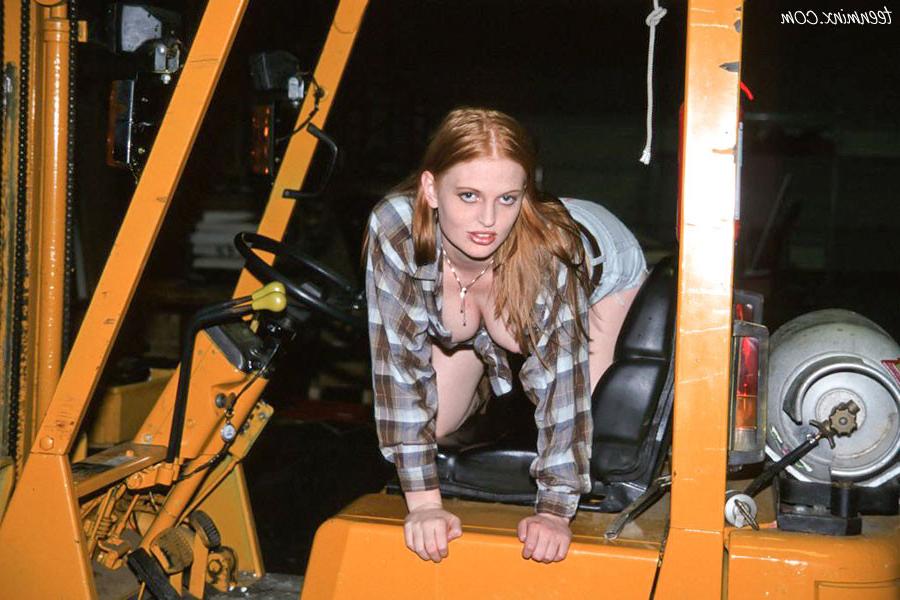 18P Freckled redhead toys her pink twat on a forklift