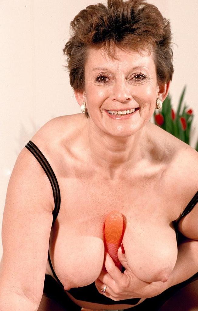 20P Horny brunette granny in lingerie playing with her dildo