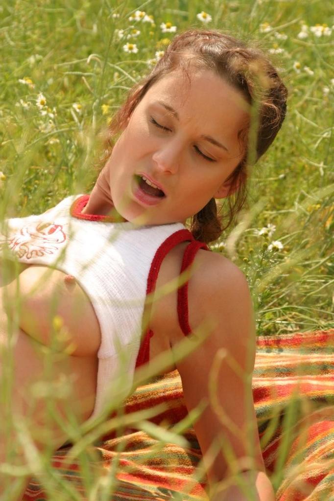 20P Horny brunette teen stuffing her pussy with a dildo outdoor