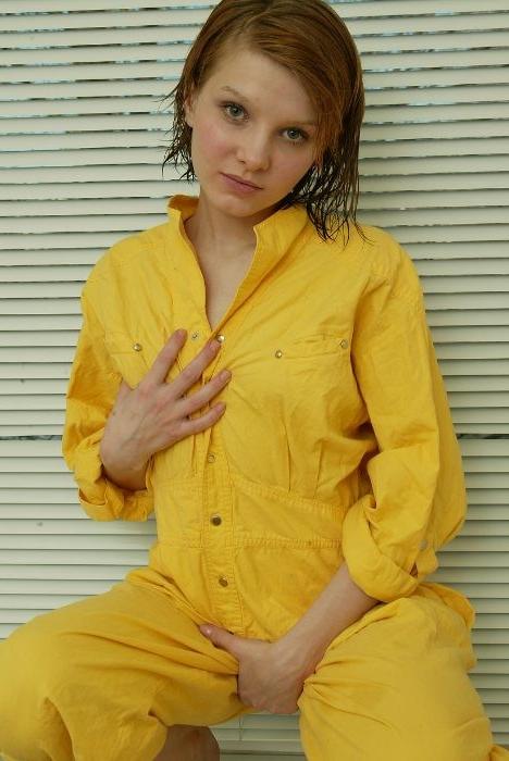 16P Nice chick in a yellow suit toying her bushy pussy
