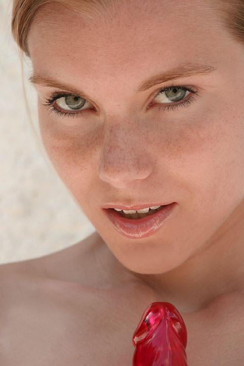 17P Freckled redhead teen toys her pussy outdoors