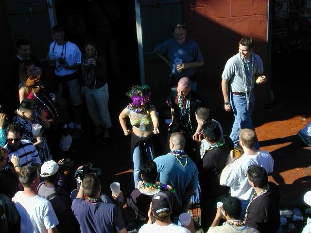 15P Drunk mardigras chicks going wild and showing their tits to the crowd