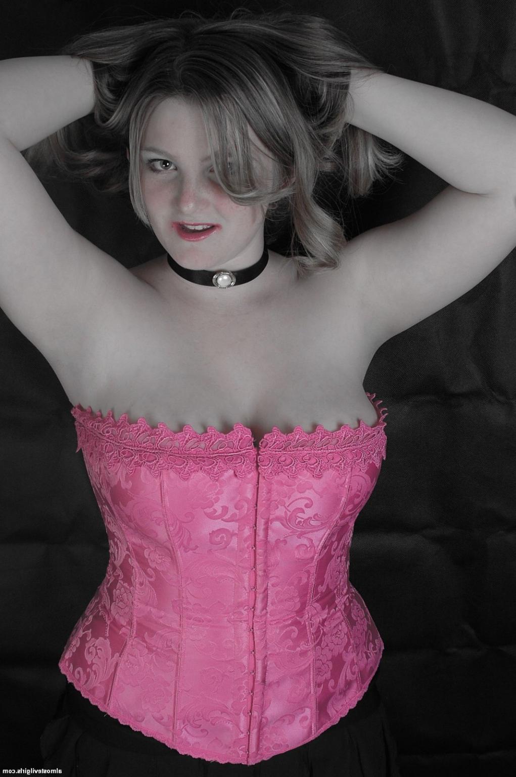 15P Madison looks sexy in a pink corset
