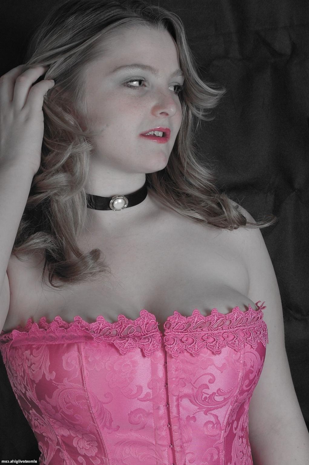 15P Madison looks sexy in a pink corset