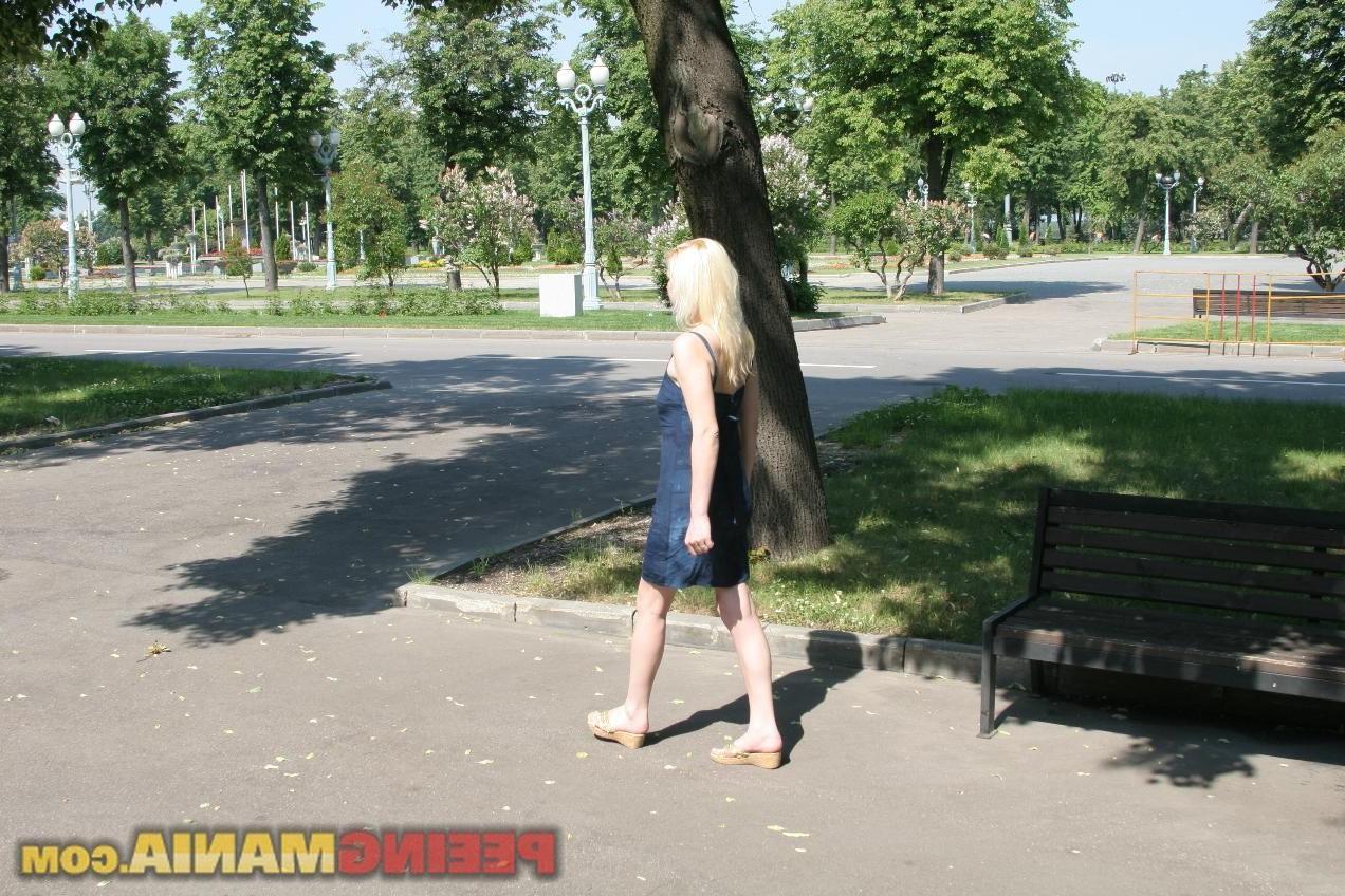 15P Blonde bunny in a blue dress pees in the white panties on the bench