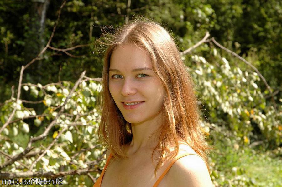 12P Young hottie in bright dress pees on forest wood