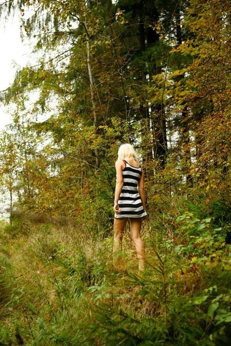 15P Beautiful blonde babe sits down in the forest and takes a piss