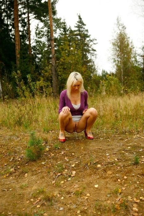 15P Yummy blonde teen without panties takes a piss in the forest