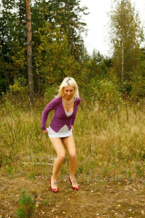 15P Yummy blonde teen without panties takes a piss in the forest