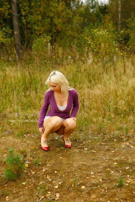 15P Yummy blonde teen without panties takes a piss in the forest