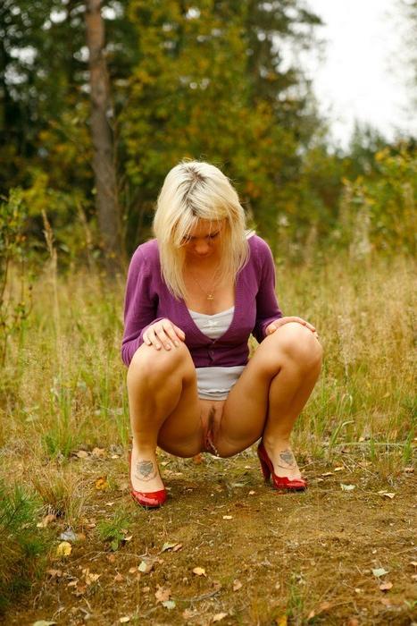 15P Yummy blonde teen without panties takes a piss in the forest