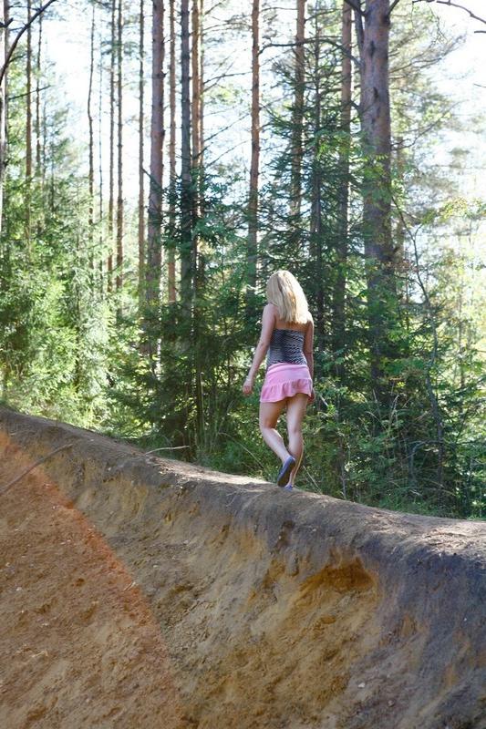 12P Pretty blonde babe with big tits takes a piss in the forest