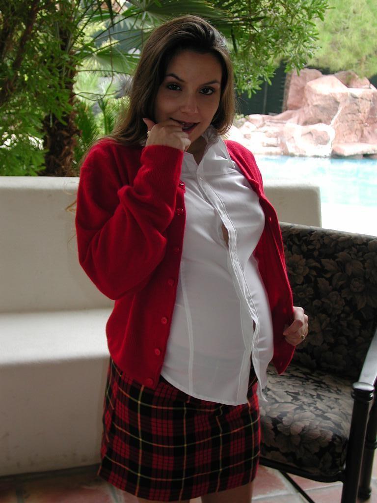 16P Hot and horny pregnant babe dildoes her hairy pussy on the sofa