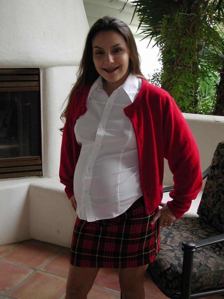 16P Hot and horny pregnant babe dildoes her hairy pussy on the sofa