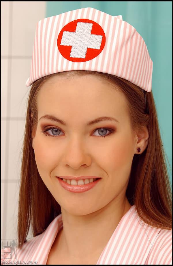 16P Cute nurse doing a footjob