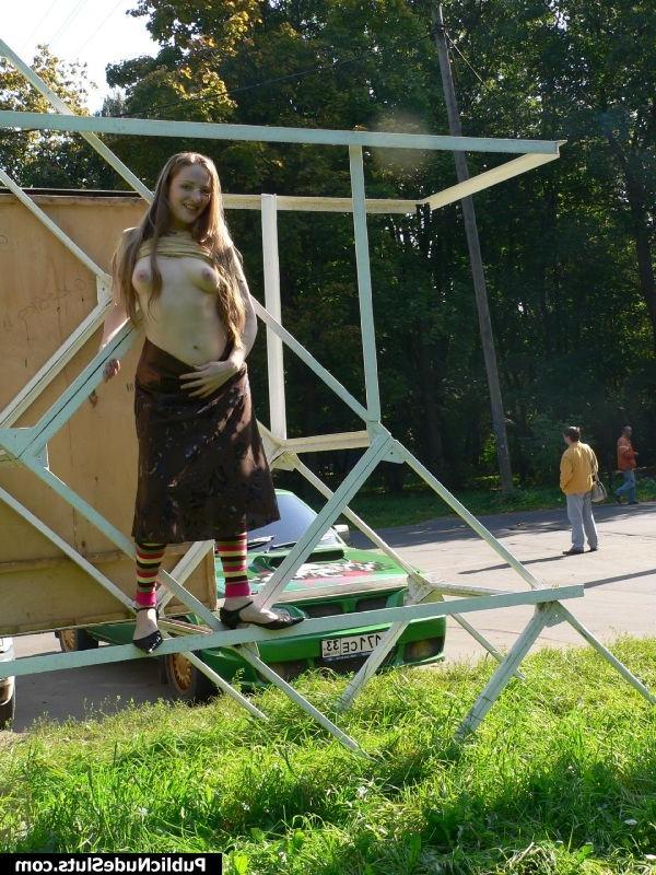 15P Playful cutie gets dirty enough to show her nude titties in the park