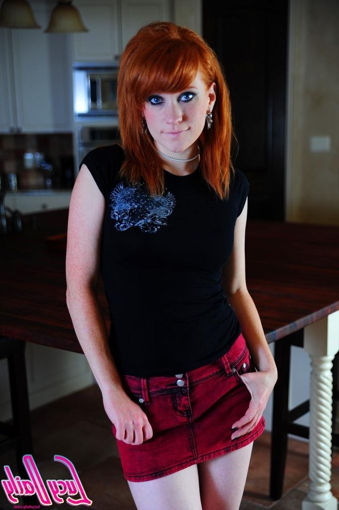 16P Beautiful redhead spreads legs
