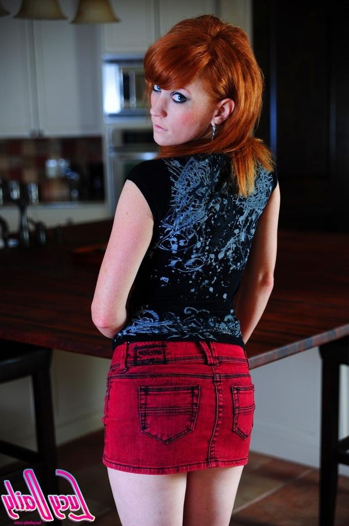 16P Beautiful redhead spreads legs