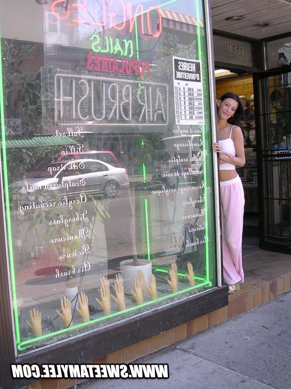 14P Brunette Sweet Amylee posing and teasing around the city
