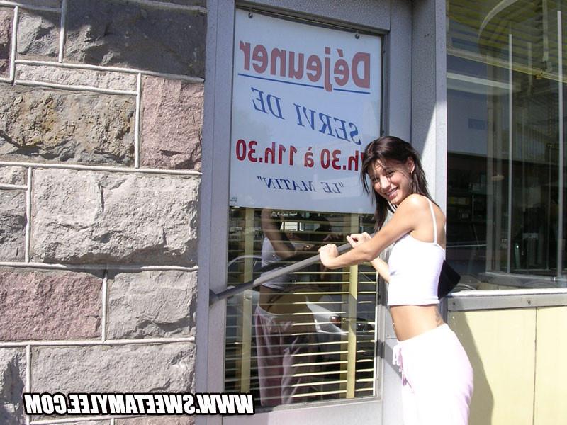 14P Brunette Sweet Amylee posing and teasing around the city