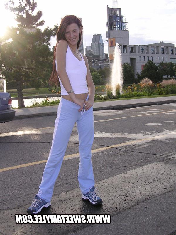 14P Teen hottie flashing her tits and posing around the city
