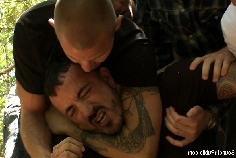 15P Horny men jump on a beefy jock and turn him into a sex slave at a campground.