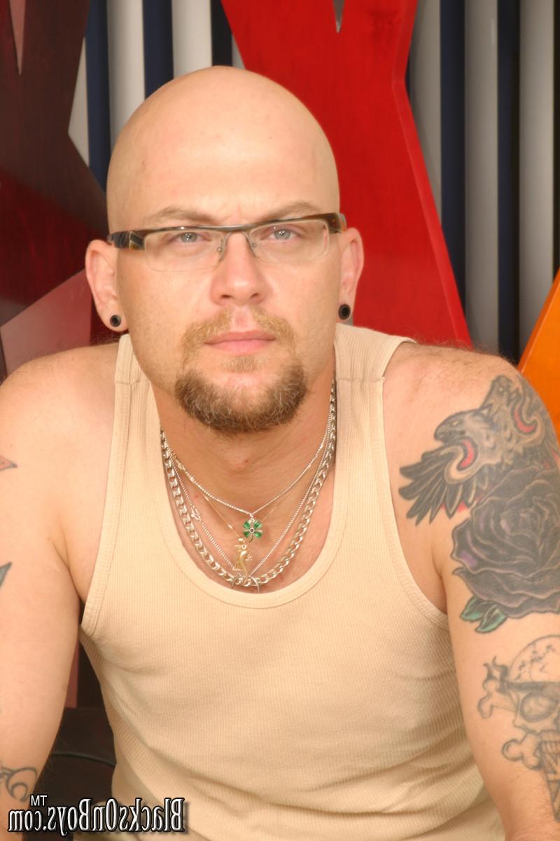15P Tattoed white stud gets anal sex by black dicks