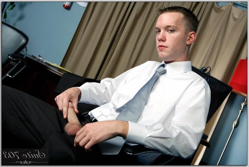 16P Hot young stud takes off his suit jerks off his big hard cock