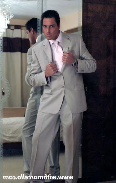14P Sexy stud strips from his suit and strokes his cock