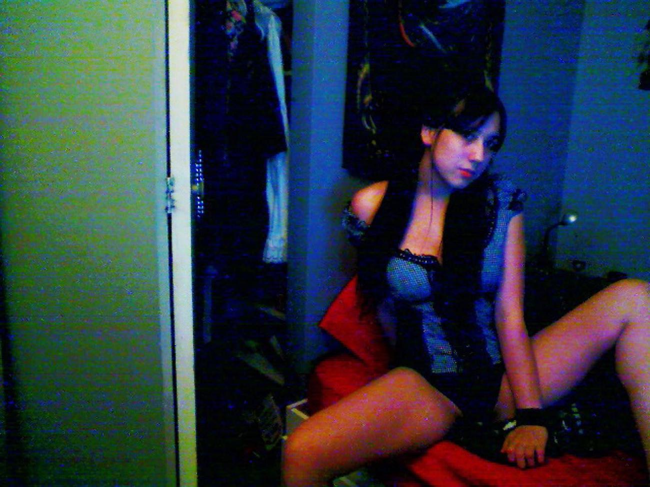 16P Pictures of a busty webcam teen toying with her pussy