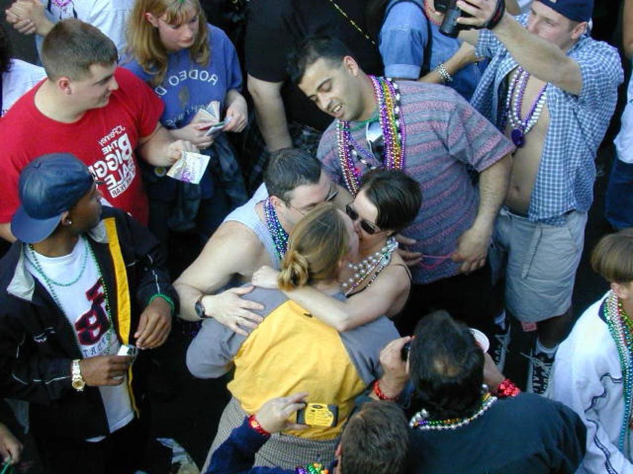 15P Drunk chicks showing tits and getting photographed at mardigras