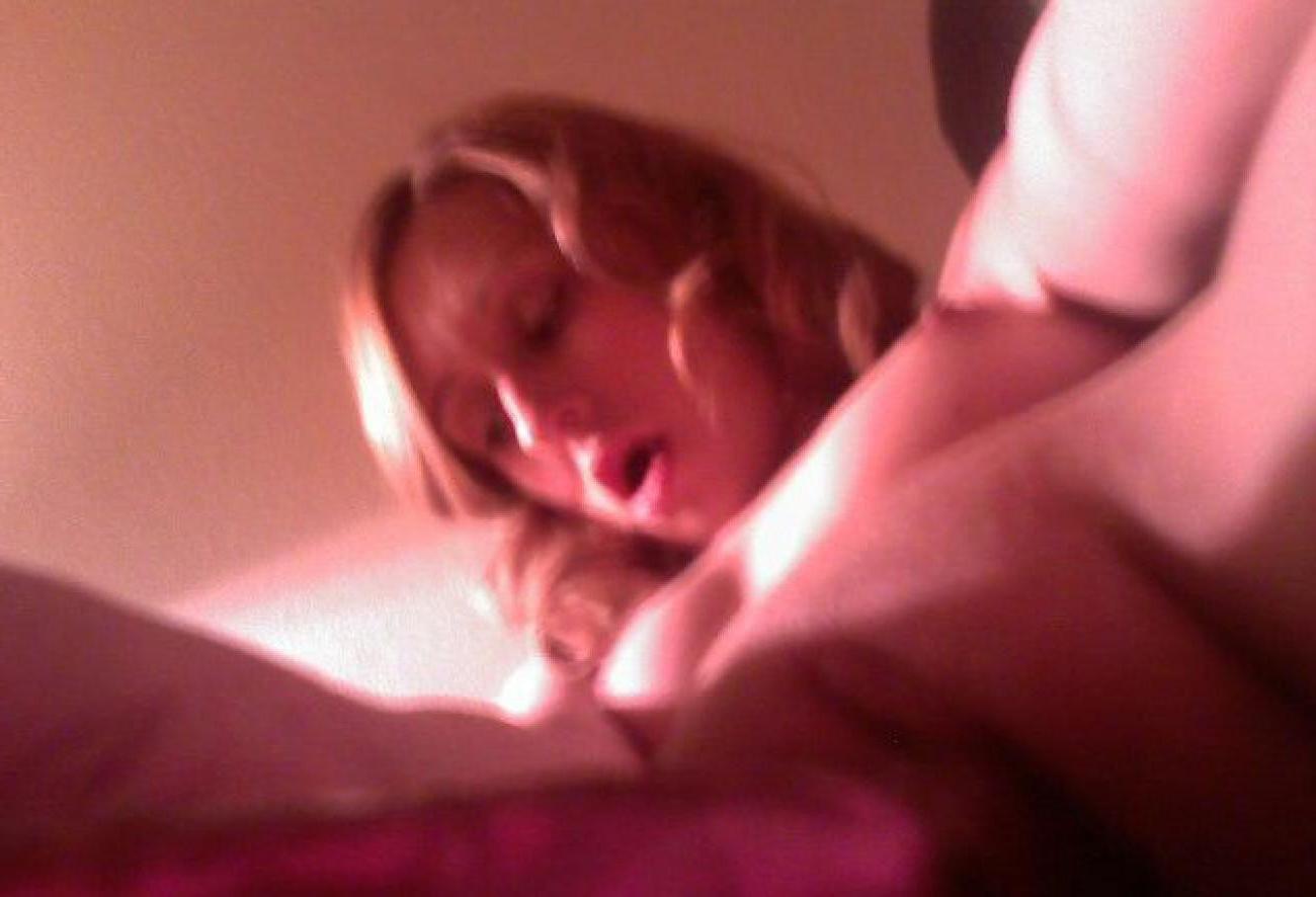 16P Pictures of a horny babe masturbating with her red dildo