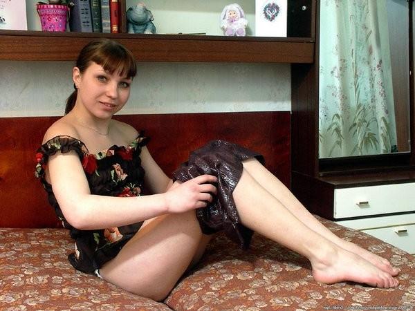 15P Sonja pulls her cotton panties aside and reveals a hairy one