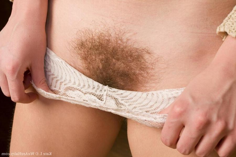 16P A European milf gets naked to show off her hairy pussy