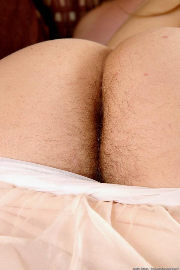 15P Busty And Hairy Amateur Being Naughty On The Couch