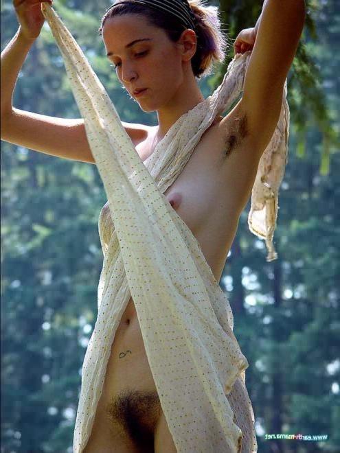15P Tall Thin Hairy Nude Comes Unwrapped Under Forest Trees