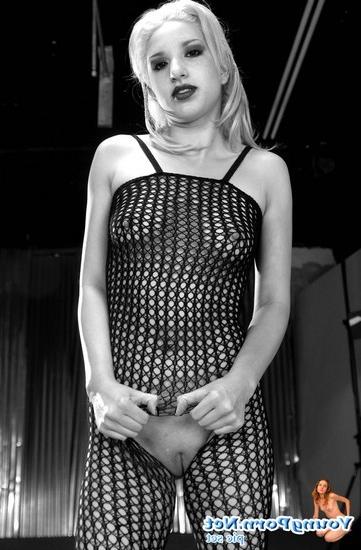 15P Blonde coed girl posing in fishnet suit