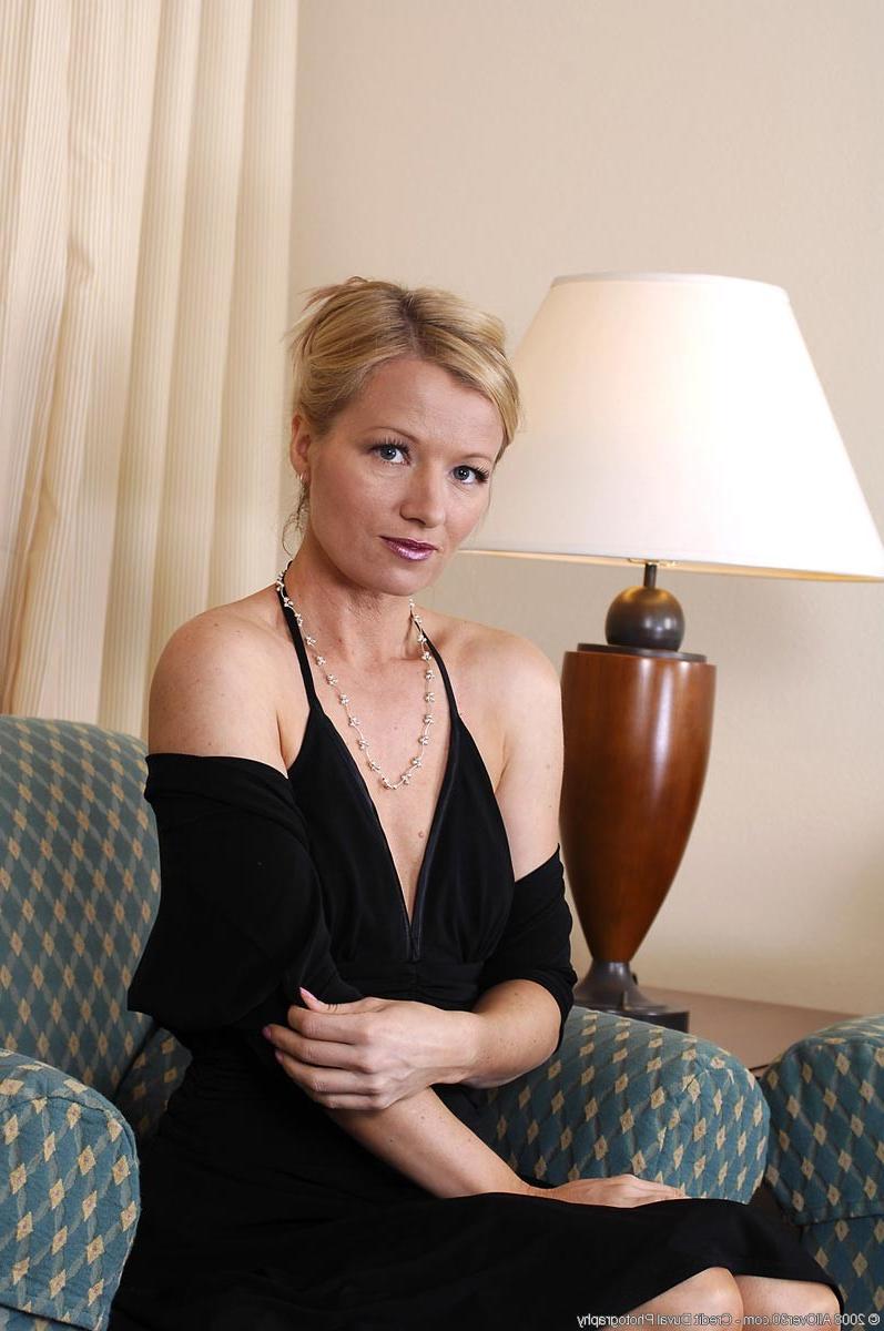 15P Petite blonde milf stripping off her sexy black dress