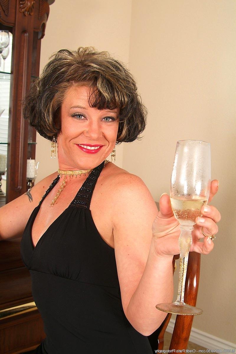15P Tight ass brunette milf strips off her black dress