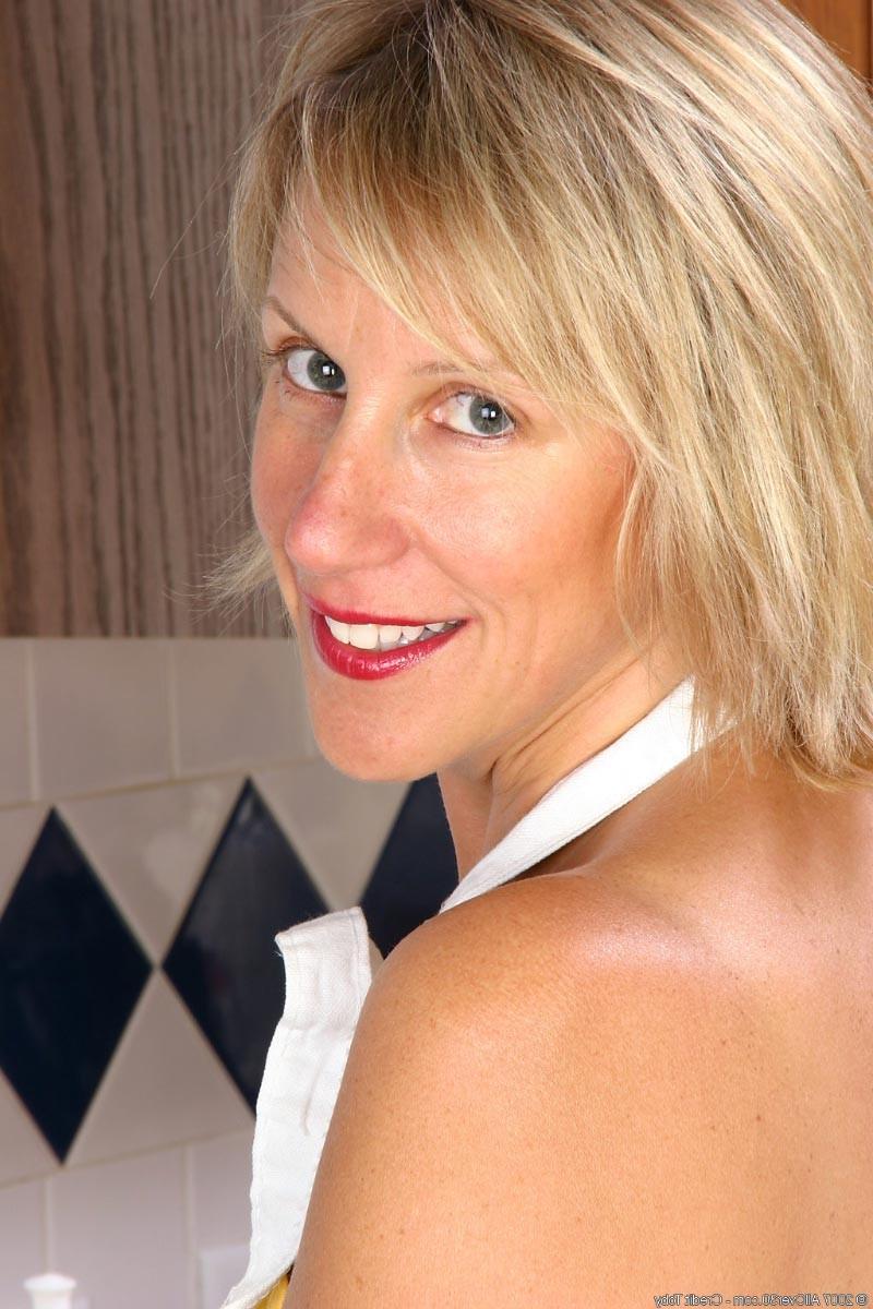 15P Sexy blonde milf having fun in the kitchen