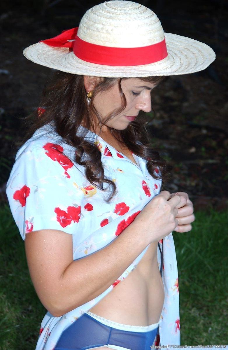 15P Horny milf with small tits having fun in the yard